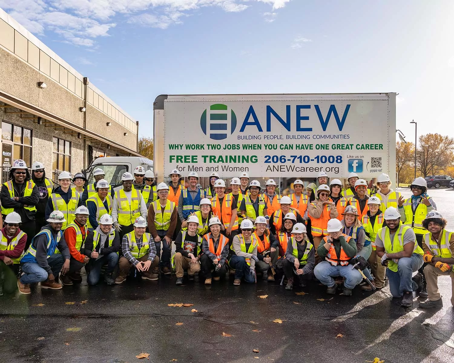 Group of apprentices in front of ANEW sign