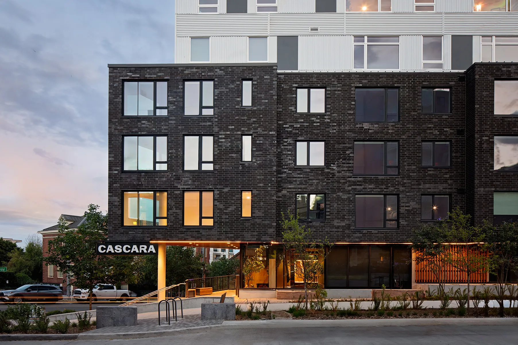 Cascara exterior lit at dusk