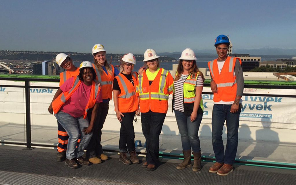 Apprentice construction workers on jobsite at Yesler